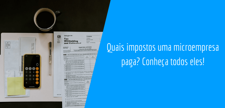 imagem ilustrativa do momento a definir quais impostos uma microempresa paga, com contas, documentos, uma xícara de café e uma calculadora de celular